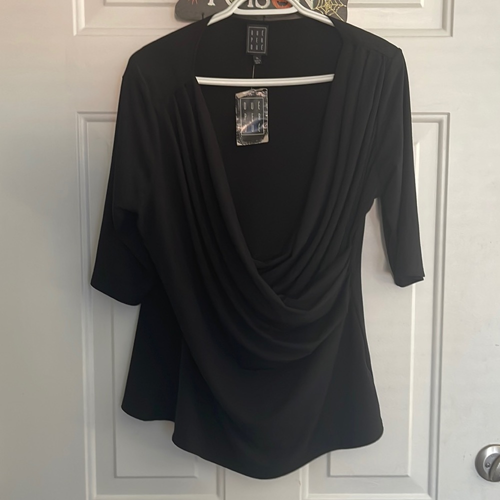 New never worn NWOT. Black top wear dressy or casual